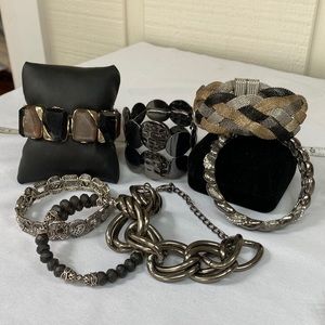 Set of 7 silverton Goldtone black bracelets